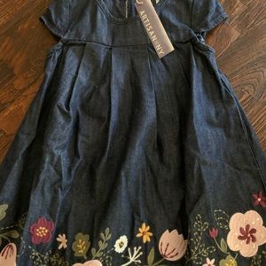 Adorable denim dress with floral detail